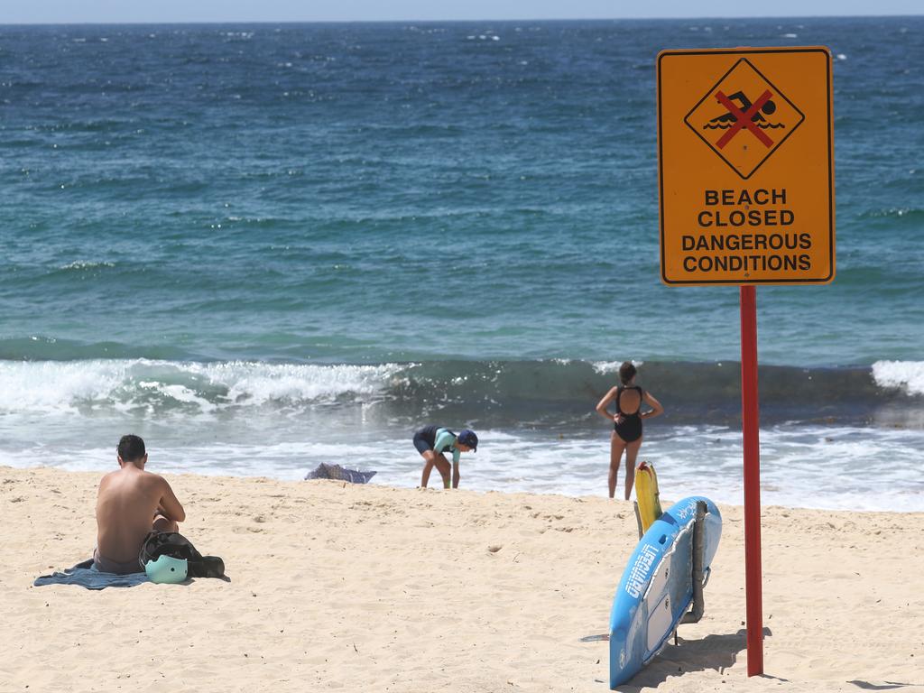 Coogee Beach was closed the day after the shark attack on Simon Nellist. Picture John Grainger