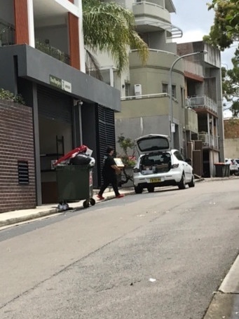 A photo taken by residents showing alcohol pick-up in the street.