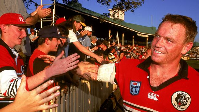 SYDNEY, AUSTRALIA - 1993:  Greg Florimo of the North Sydney Bears celebrates with fans during a NSWRL match held at North Sydney Oval 1993, in Sydney, Australia. (Photo by Getty Images)