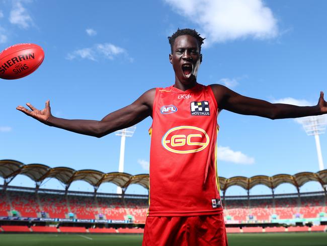 GOLD COAST, AUSTRALIA - SEPTEMBER 11: Mac Andrew poses during a media opportunity after re-signing with the Gold Coast Suns on September 11, 2024 in Gold Coast, Australia. (Photo by Chris Hyde/Getty Images) *** BESTPIX ***