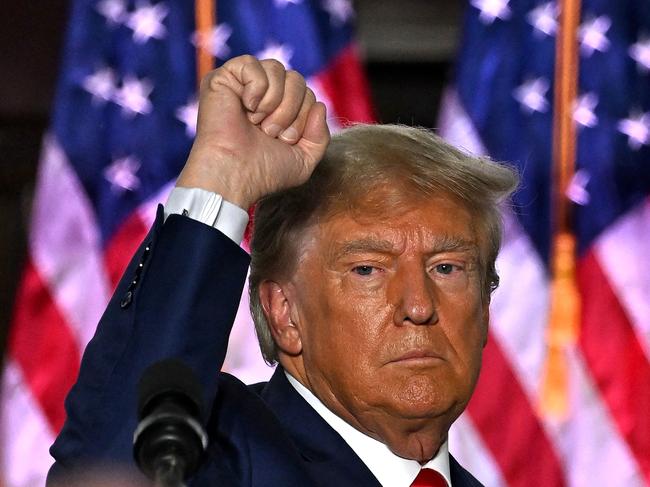 Former US President Donald Trump gestures after delivering remarks at Trump National Golf Club Bedminster in Bedminster, New Jersey, on June 13, 2023. Trump appeared in court in Miami for an arraignment regarding 37 federal charges, including violations of the Espionage Act, making false statements, and conspiracy regarding his mishandling of classified material after leaving office. (Photo by Ed JONES / AFP)