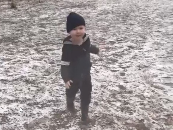 Clancy Willett, 2, is excited as snow falls in Eukey, Queensland. Photo: Supplied