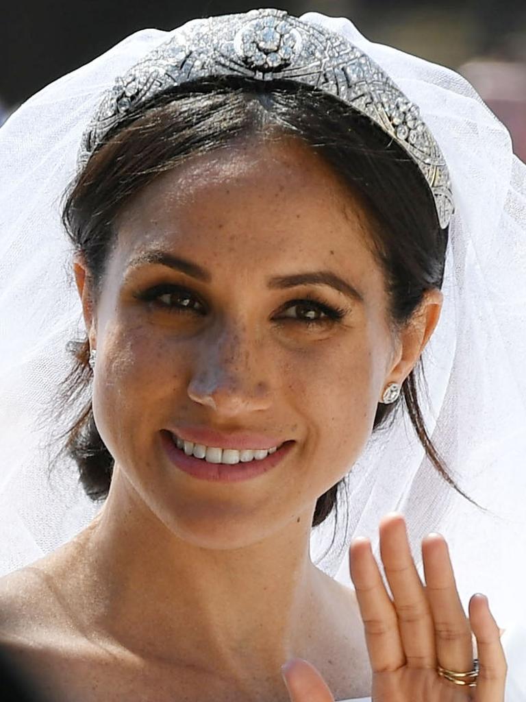 Meghan Markle in Queen Mary’s diamond art deco tiara on her big day. Picture: Bruce Adams – WPA/Getty Images.