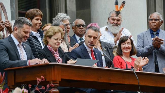 Attorney General Kyam Maher, left, Governor Frances Adamson, Premier Peter Malinauskas and deputy Premier Susan Close sign the bill on the steps of Parliament House to pass SA’s Voice to Parliament. Picture: NCA NewsWire / Brenton Edwards