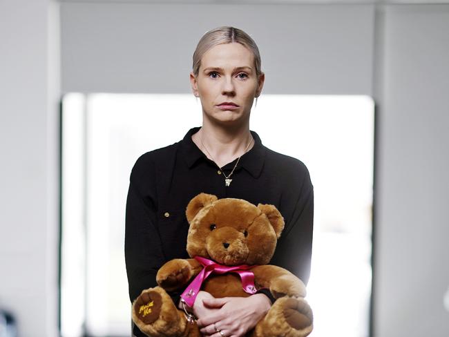 Fighting back her overwheming urge to curl up in a ball, Kelly O’Brien found a way to be Charlotte’s voice. Charlie Bear now contains her little girl’s ashes. Picture: Sam Ruttyn