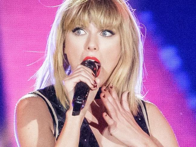 (FILES) This file photo taken on October 21, 2016 shows singer-songwriter Taylor Swift performing her only full concert of 2016 during the Formula 1 United States Grand Prix at Circuit of 6 in Austin, Texas. Top US musicians took to social media November 8, 2016 urging fans to vote after a presidential campaign in which celebrities overwhelmingly backed Democratic candidate Hillary Clinton. Pop superstar Taylor Swift -- who had been silent about the election -- posted a picture of herself on Instagram dressed casually as she waited in a long line at a polling station.  / AFP PHOTO / SUZANNE CORDEIRO