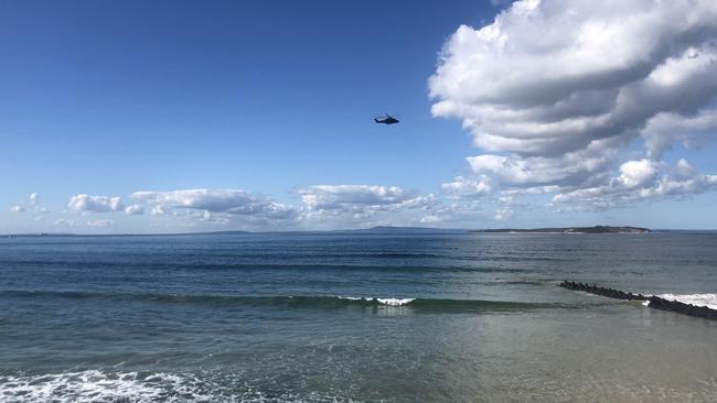 A police chopper searches for a woman who was reported missing on Thursday morning. Picture: Mandy Squires