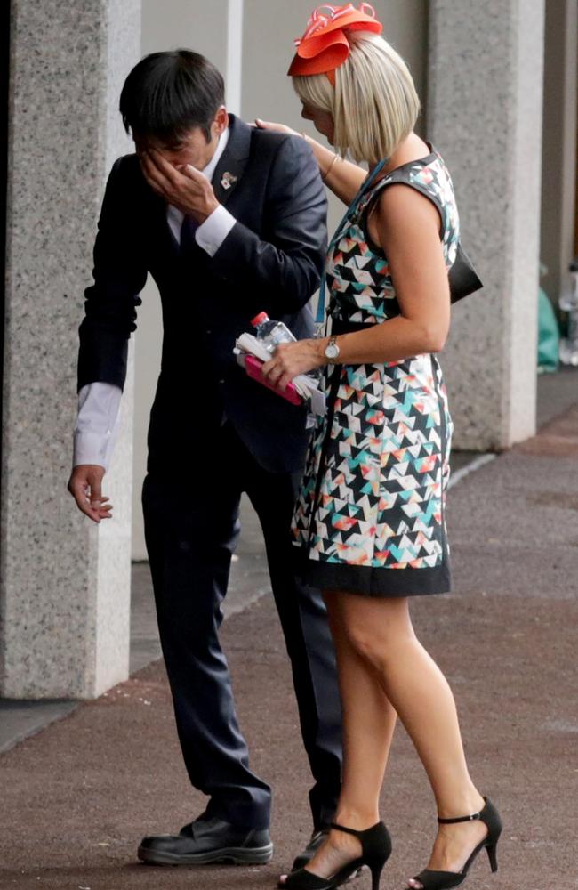 A devastated connection of Admire Rakti is consoled after the horse’s death.