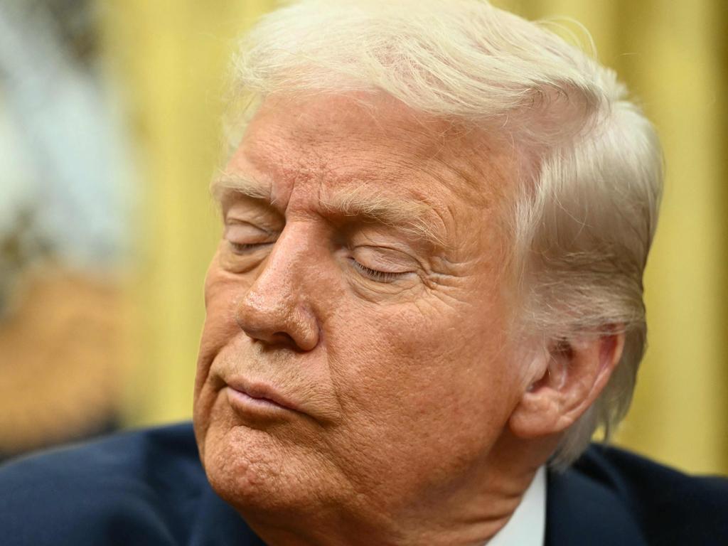 TOPSHOT - US President Donald Trump speaks after signing executive orders in the Oval Office of the White House in Washington, DC on March 6, 2025. (Photo by Mandel NGAN / AFP)