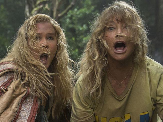 This image released by 20th Century Fox shows Goldie Hawn, right, and Amy Schumer in a scene from "Snatched." (Justina Mintz/20th Century Fox via AP)