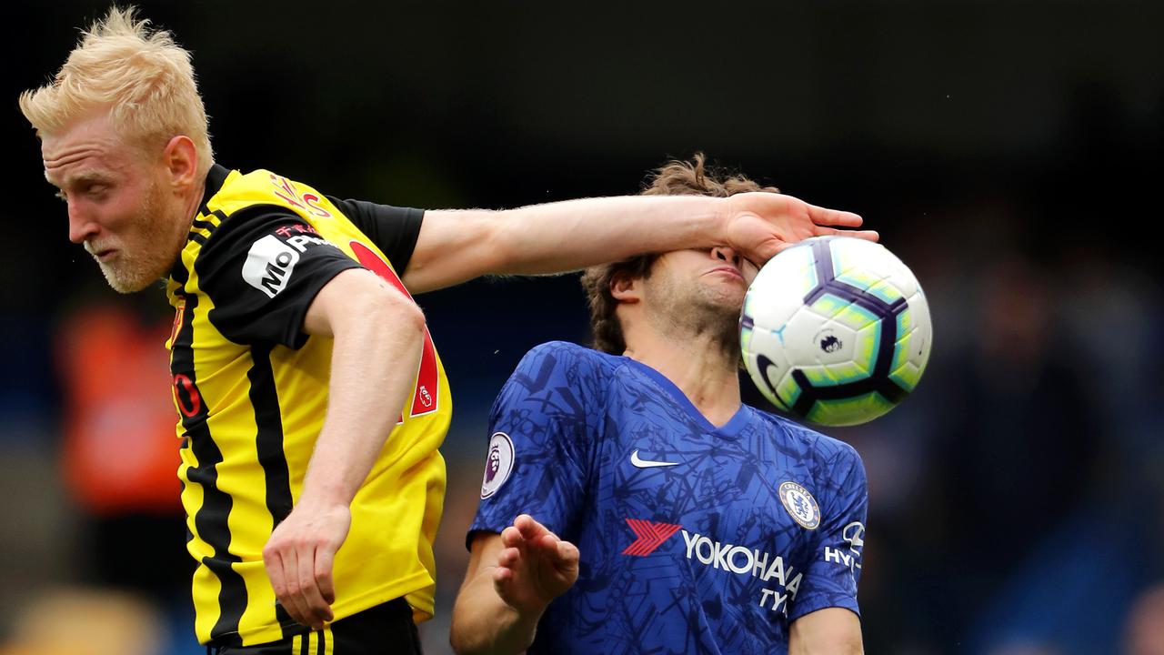 Watford’s  Will Hughes clashes with Chelsea’s Marcos Alonso at Stamford Bridge in London. Picture: Richard Heathcote/Getty