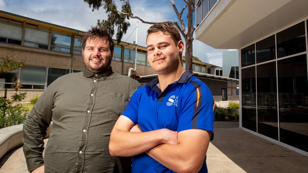 Cameron James and youth worker Benjamin Cailler. Picture: Brett Hartwig