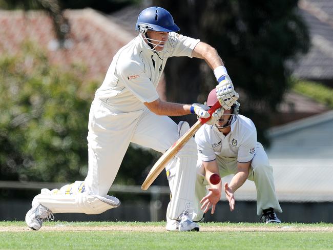 s39ho934 VTCA Cricket. Greenvale (batting) V Old Mentonians (fielding) in Altona North. Batsman Matthew Drain and fieldsman Nick Doyle.