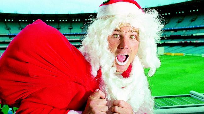 Shane Warne pictured as Santa at the MCG in 1994. The Melbourne Boxing Day Test has long been a part of Warne’s seasonal plans.