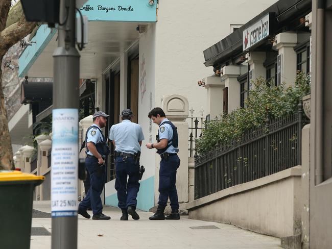 Police out front of Crane Bar which is run by Ibrahim’s girlfriend Sarah Budge. Picture: Richard Dobson