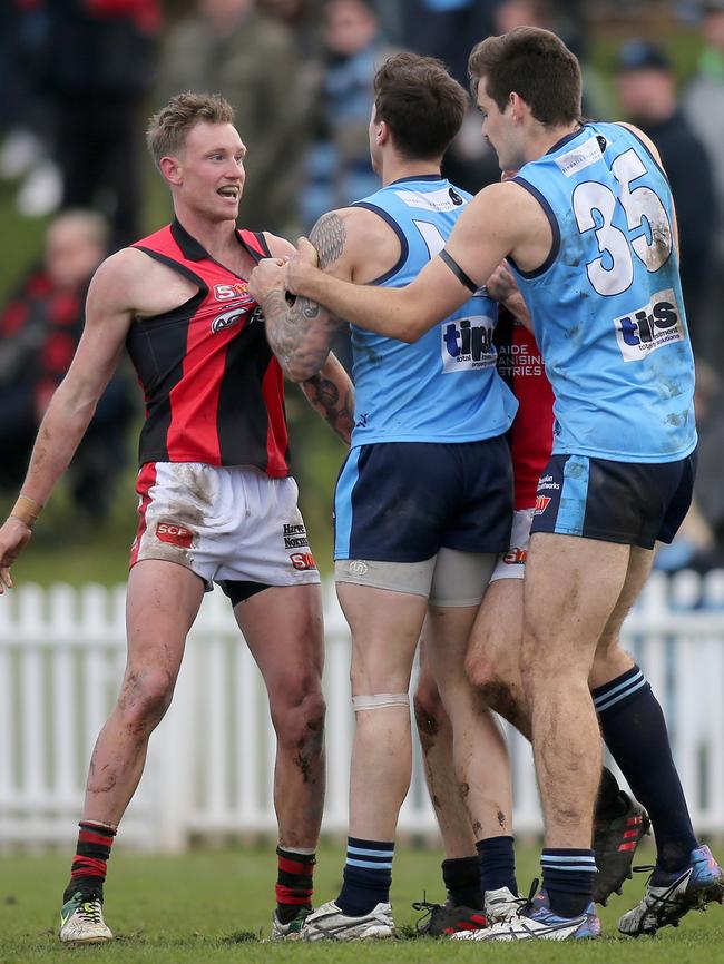 Hang on Errin Wasley-Black. Sturt's Joel Thiele and Tom Read needed to get a grip. Picture: Dean Martin/AAP