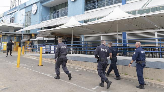 Police patrol the Sydney Fish Markets during the height of the pandemic to enforce health orders. Picture: Brook Mitchell