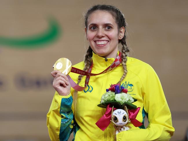 IZU, JAPAN - AUGUST 27: Gold medalist Amanda Reid of Team Australia celebrates on the podium during the medal ceremony for the Track Cycling Women's C1-2-3 500m Time Trial on day 3 of the Tokyo 2020 Paralympic Games at Izu Velodrome on August 27, 2021 in Izu, Shizuoka, Japan. (Photo by Kiyoshi Ota/Getty Images)