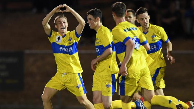 Fraser Hills celebrates after scoring against Moreland Zebras. Picture: AAP