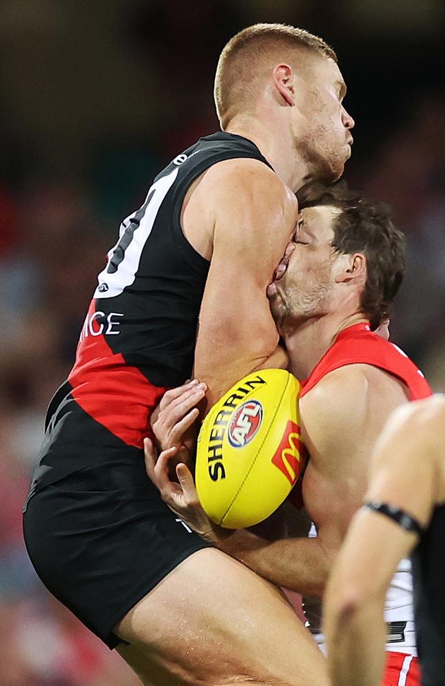 Peter Wright collects Harry Cunningham. (Photo by Mark Metcalfe/AFL Photos/via Getty Images )