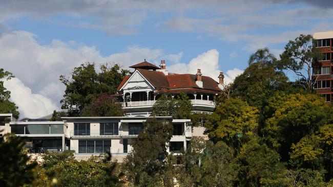 Lamb House, which sits atop the Kangaroo Point cliffs, has been abandoned by its owner. Picture: AAP Image/Richard Waugh