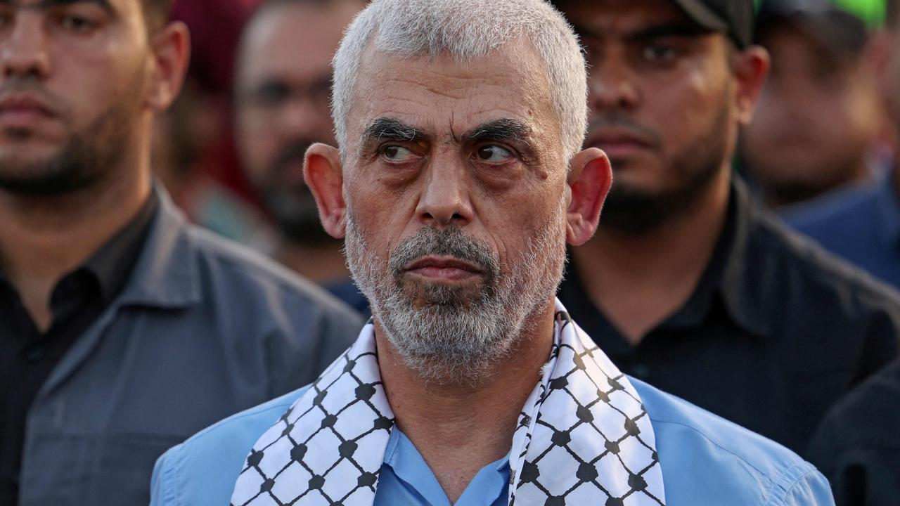 Head of the political wing of the Palestinian Hamas movement in the Gaza Strip Yahya Sinwar attends a rally in support of Jerusalem's al-Aqsa mosque in Gaza City on October 1, 2022. (Photo by MAHMUD HAMS / AFP)