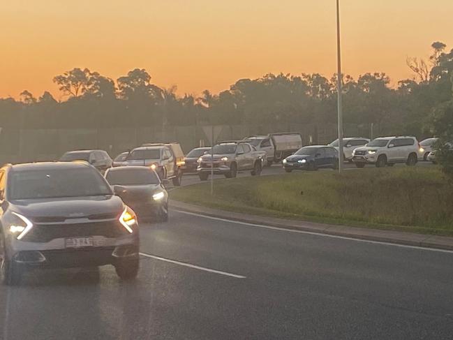 Traffic was moving slowly near Caloundra hours after a motorbike and car collided.