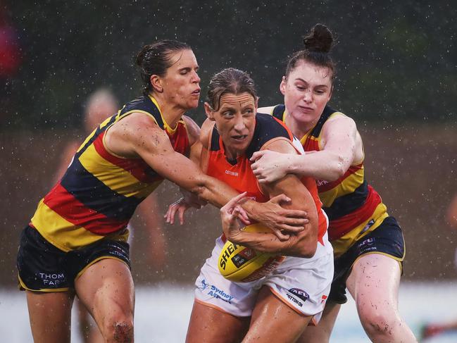 Giant’s Cora Staunton tackled by Adelaide’s Chelsea Randall (left) and Jessica Allan. Photo Phil Hillyard