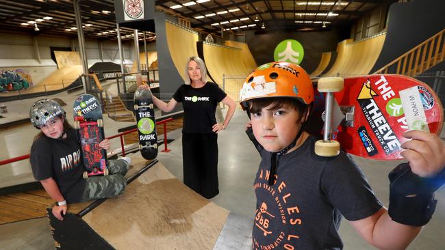 The Park Geelong, an indoor skate park, has not been allowed to reopen. From left: Chloe Miller 12yrs, Rosie Atkins (owner, The Park) and Noah Miller 10yrs inside the skate park. Picture: Glenn Ferguson