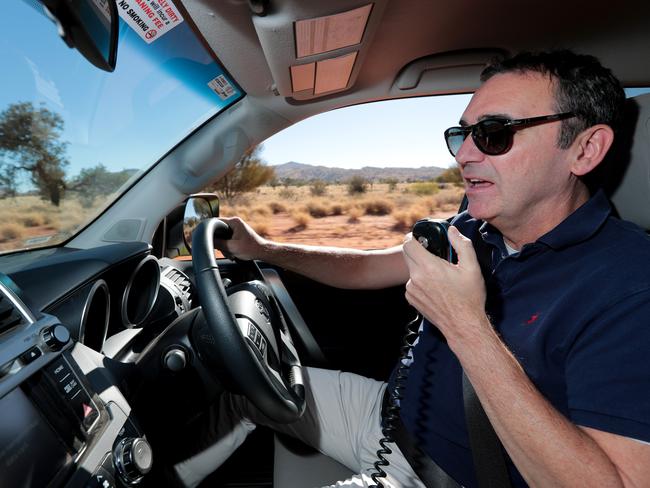 Steven Marshall speaking on the radio with Aboriginal elders during his annual 1200km drive through the APY lands.