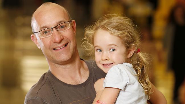 Carl and Pheobe Dixon, 4, were shopping at Indooroopilly. Picture: Josh Woning/AAP