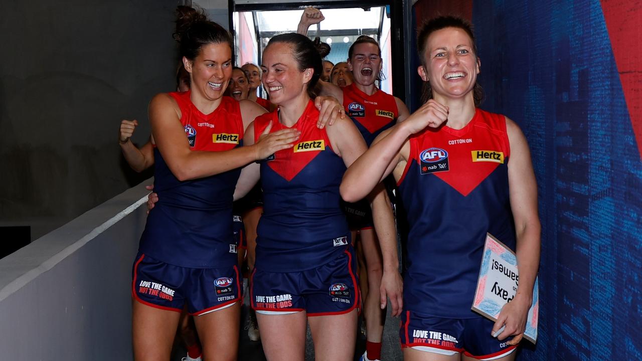 Libby Birch, pictured left with Daisy Pearce, hopes Melbourne can win a premiership for the Demons captain. Picture: Getty Images