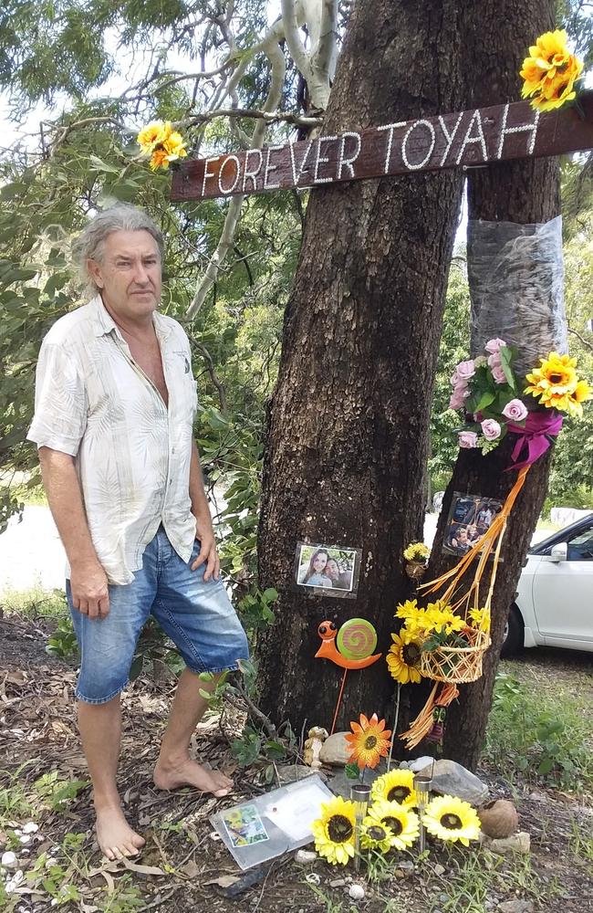 Troy Cordingley returned to Wangetti Beach to lay flowers at the location where he found the body of his daughter Toyah.