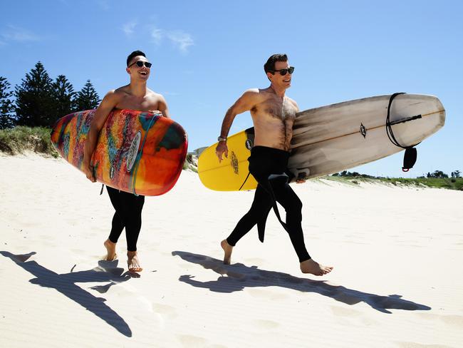Shirtless Cyrus Villanueva and X Factor mentor Chris Isaak hit the surf ...