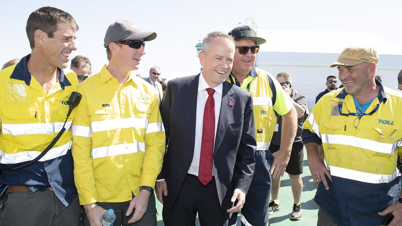 Bill Shorten posed for photos with Toll workers in Port Melbourne this month. Picture: AAP/Ellen Smith