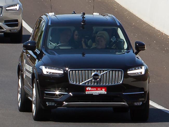 4 Volvo XC90 cars. The second one (black) is driverless.