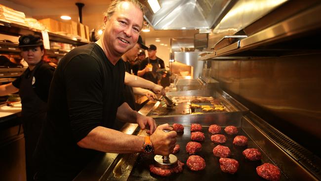 Opting for more casual fare ... Neil Perry at his Burger Project eatery in Melbourne. Picture Norm Oorloff.