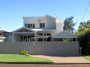 COMPLAINTS: This Mount Lofty property was approved through Toowoomba Regional Council for a 1.2m fence, but owners built it at 1.8m high. Picture: Contributed