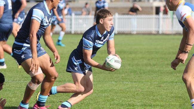 DAILY TELEGRAPH. MAY 7, 2025. Pictured is The Peter Mulholland Cup at Ringrose Park, Wentworthville today. Patrician Brothers Blacktown (blue and yellow) v Matraville SHS. Picture: Tim Hunter.