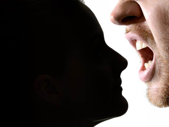 Dramatisation of man biting the nose of a woman. (Image digitally altered).Photo: Rob Williams / The Queensland Times