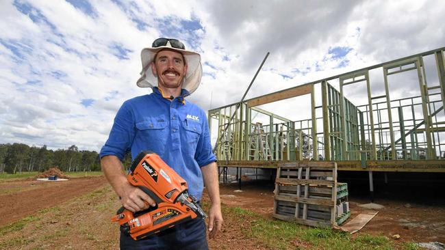 ALL SMILES: Gympie builder Jacob Buhle considers himself "lucky” he hasn't fallen victim to building company collapses, but welcomes news the State Government will launch a Special Joint Taskforce into the issue.