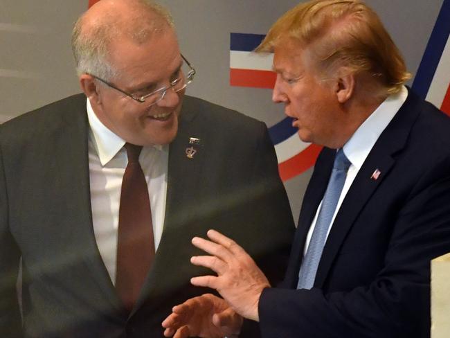 US President Donald Trump and Australia's Prime Minister Scott Morrison leave together after a meeting during the G7 Summit in the town of Biarritz, France. Picture: AAP