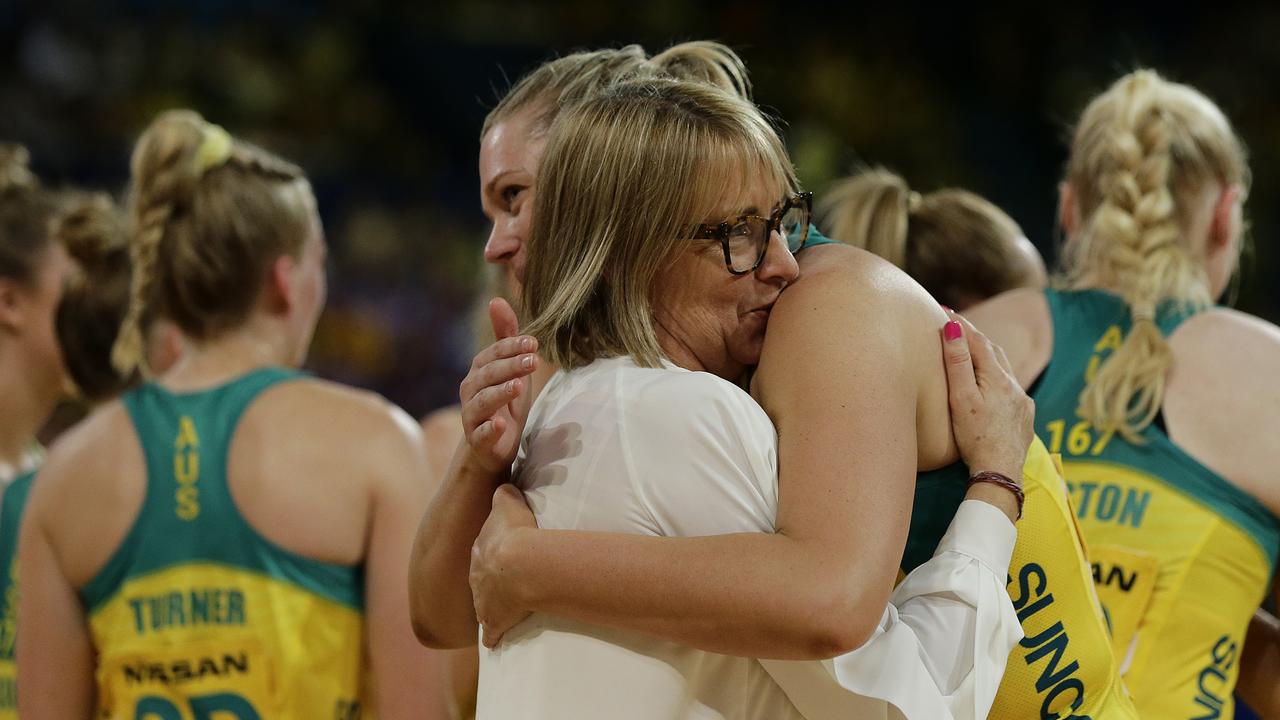 Lisa Alexander, coach of the Diamonds hugs Caitlin Thwaites of the Diamonds.