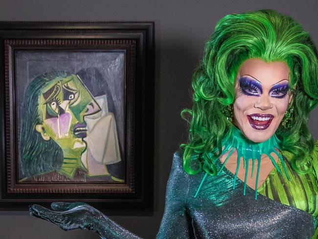 Drag Queen Art Simone in her Weeping Woman dress next to the painting by Pablo Picasso, which forms part of NGV exhibition The Picasso Century. The exhibition closes on October 9. Picture: Jason Edwards