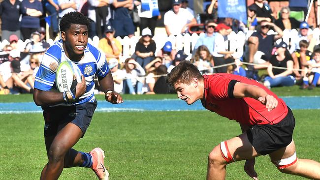 Nudgee College player Lastus Auakai braces for impact by Gregory Terrace’s Fergus Nasser. Picture: AAP image/John Gass