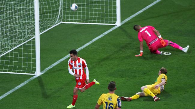 Adrian Luna, left, scores for Melbourne City against Central Coast Mariners at AAMI Park. Picture: AAP