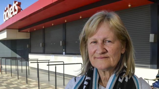 Power fan Kerry Coleman lined up at Adelaide Entertainment Centre on Monday only to discover it didn’t open until 11am. Picture: Roy VanDerVegt