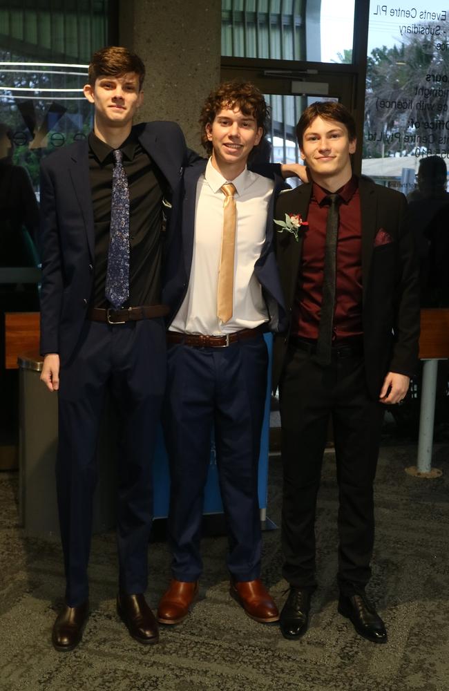 Jarvis Hallam, Joshua Lawlor and Cooper Thompson celebrate their 2023 St John's College formal.