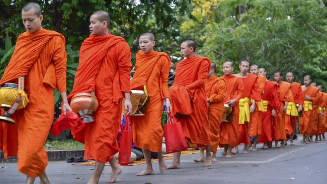 Did you actually bother stopping to talk to locals, like these monks in Luang Prabang?