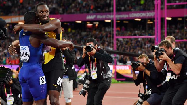 Jamaica's Usain Bolt, right, embraces winner Justin Gatlin, of the US, after the 100m final. Picture: AFP